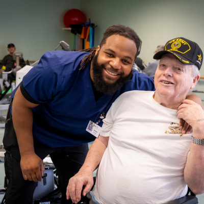 CNA with resident in the wellness center.